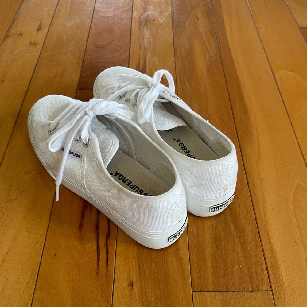 Superga white platform sneakers.